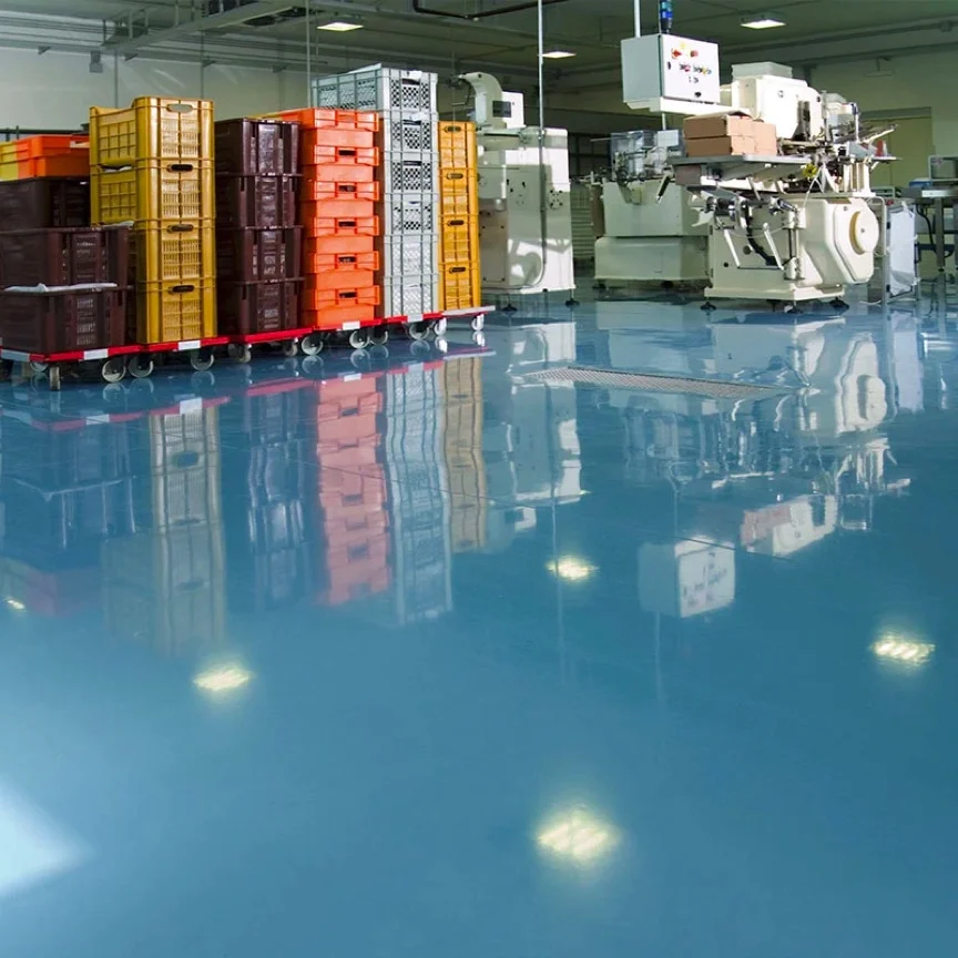 Blue Epoxy Floor Coating In A Manufacturing Plant